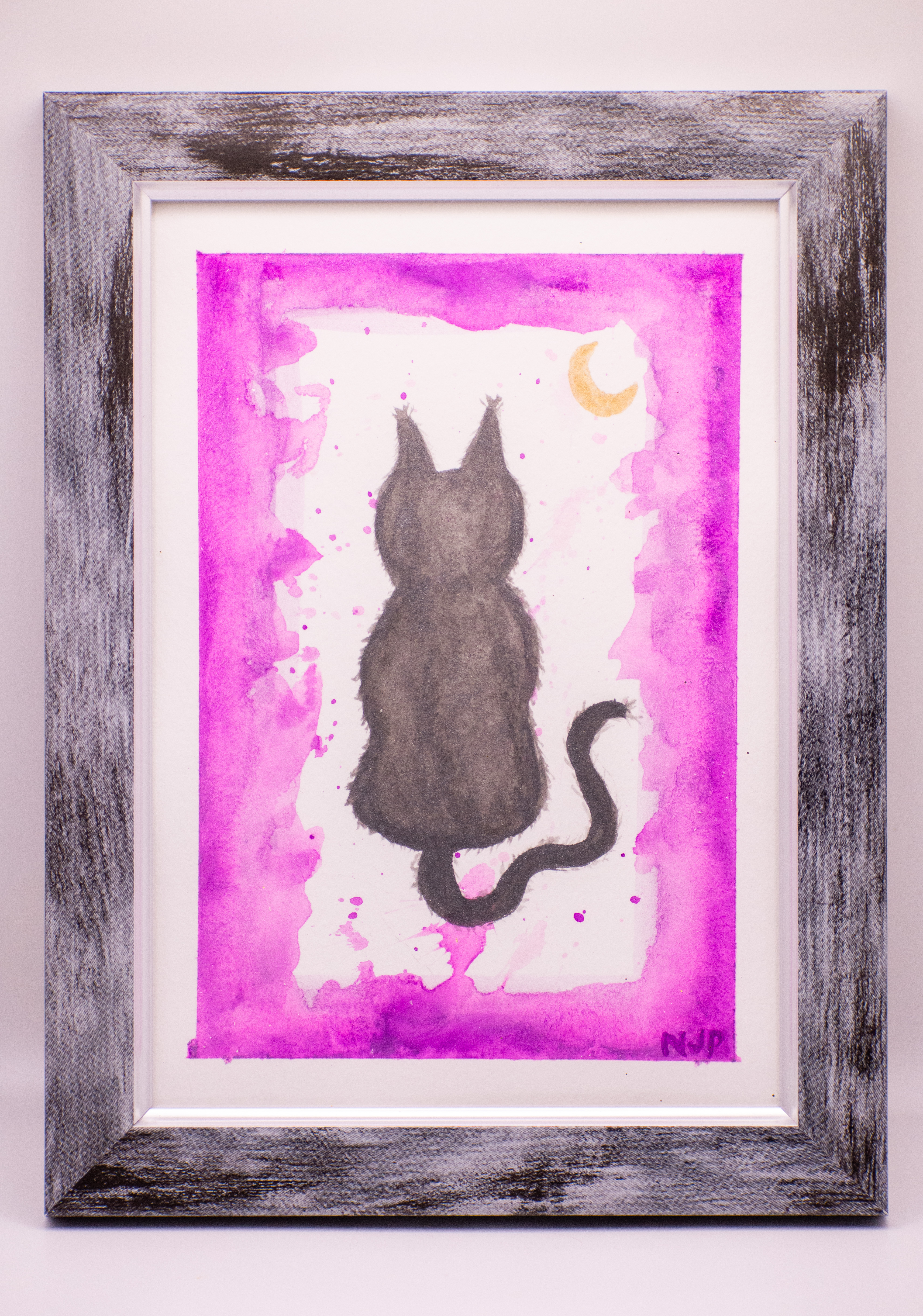watercolor painting of a black cat and a yellow moon