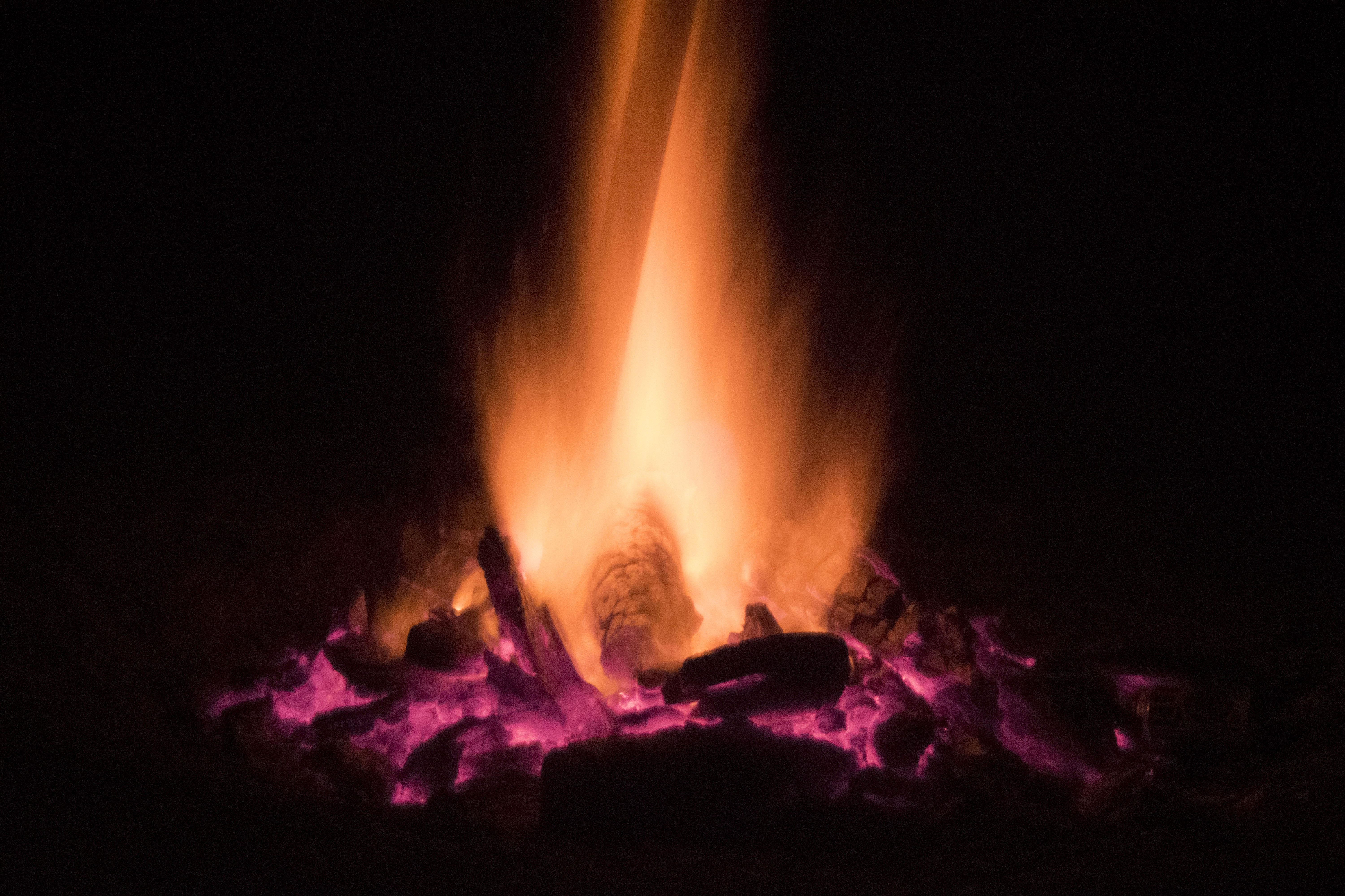 photo of a fire with a black background