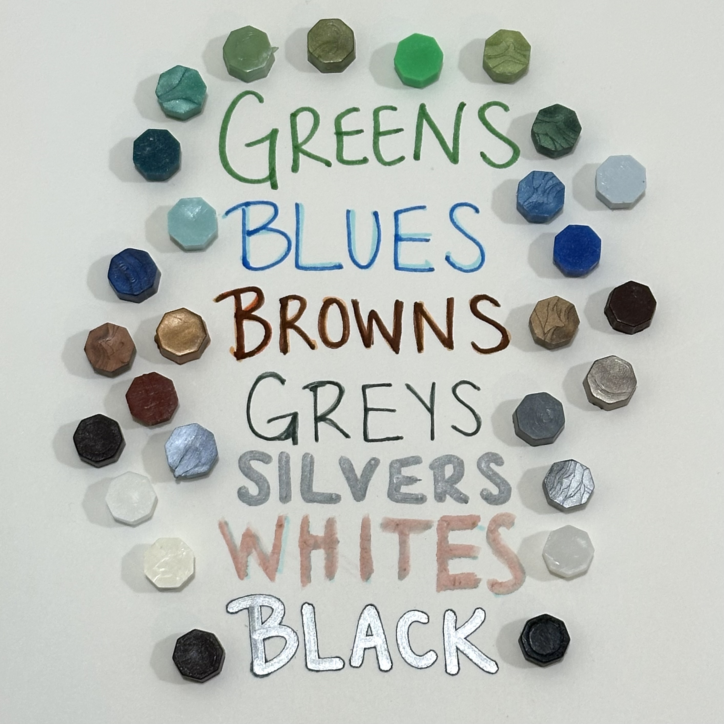 an assortment of colorful wax beads